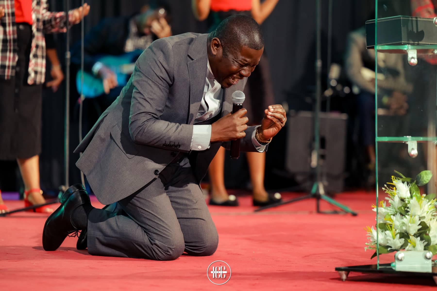 Pastor in prayer at ICC Kitengela